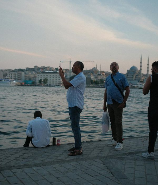 Person feeling vibrant and full of life, stretching towards the sky.